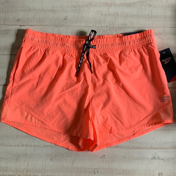Reebok Pants - Reebok Resolve short Coral